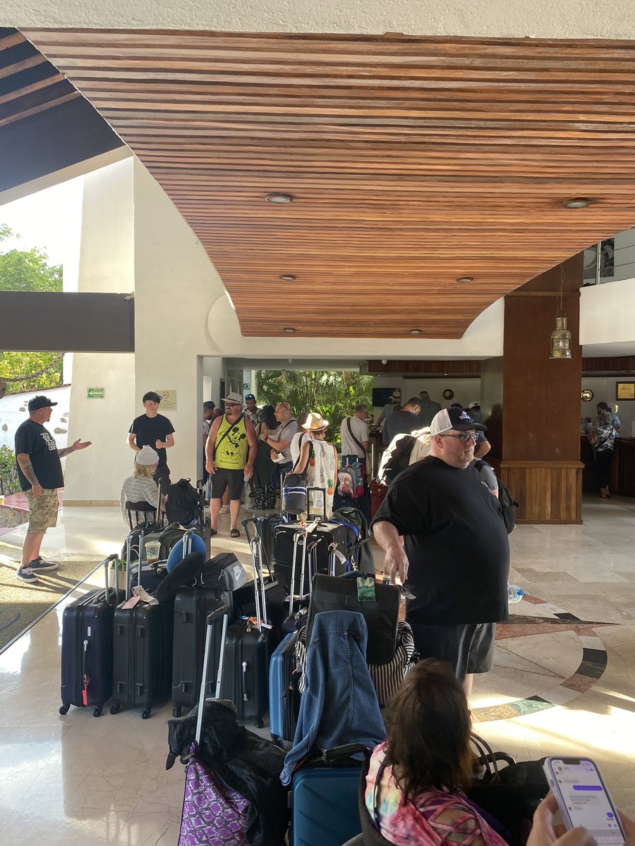 kl4ssy's tweet photo. @SunwingVacay @WestJet whole plane full of Canadians from WG528 sitting in a hotel lobby with no updates from Sunwing, no food, and hotel has no rooms.  What’s going on? https://t.co/5IpqEEYMKX