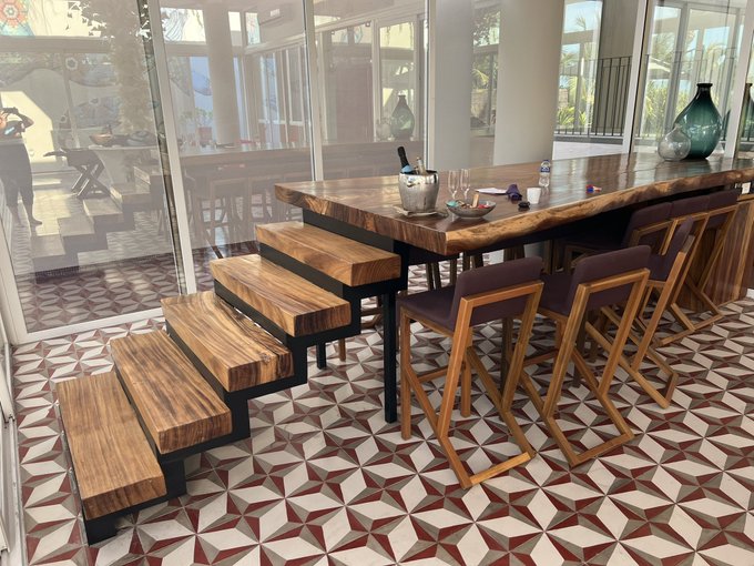 Help me out Twitter?   Table in hotel in Mexico has a staircase leading up to it. 🤔  Would the idea be<a href="/tag/oneteam"class="tags"><span>#oneteam</span></a>