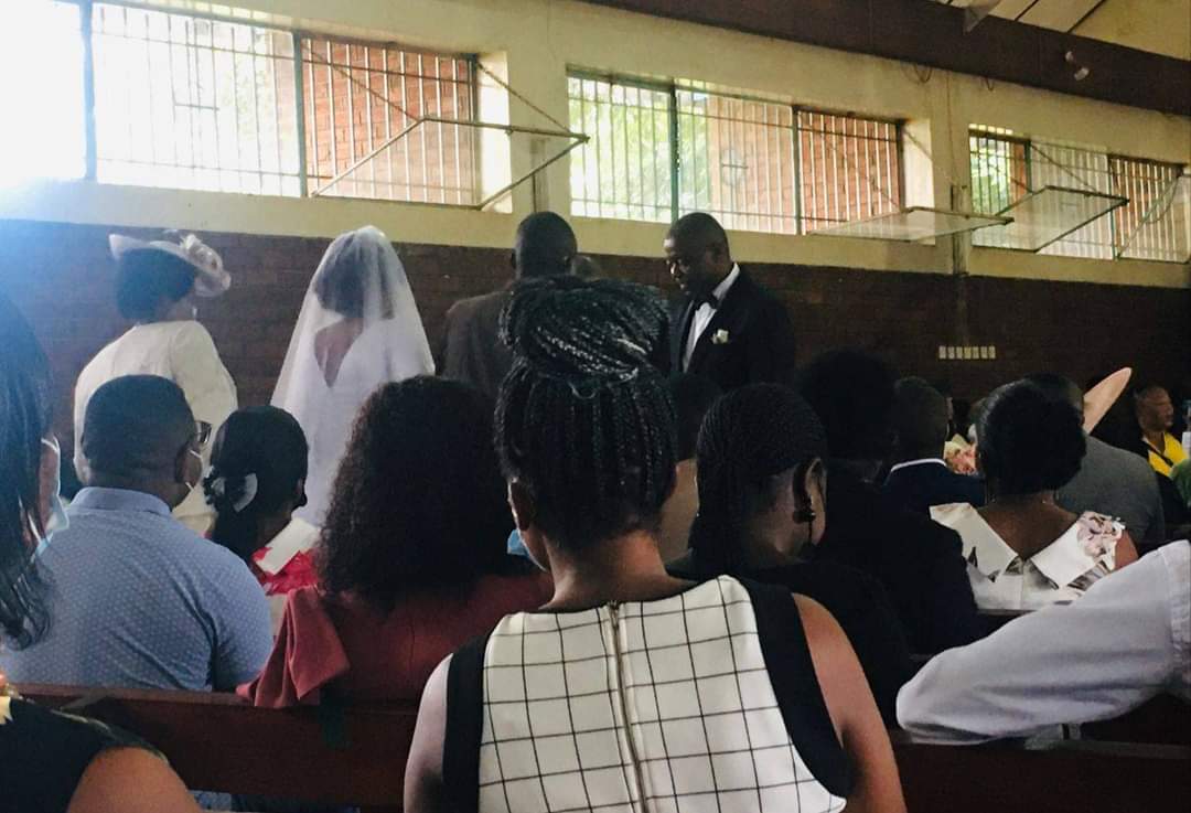 Done deal. Kazako exchanges marriage vows with his beautiful wife, Chikondi Moyo