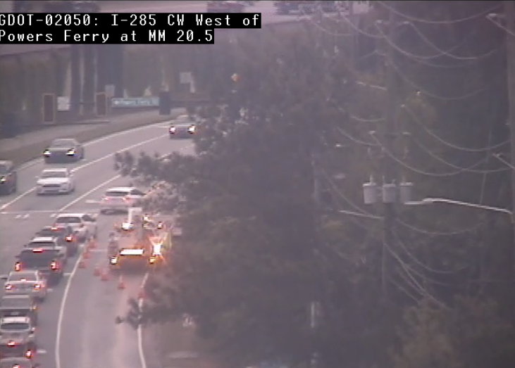 CobbDOT's tweet photo. Traffic signal dark at Powers Ferry Rd & Akers Mill Rd. Signal techs on site making repairs to damaged signal cabinet. Expect #Delays #4WayStop #ATLtraffic https://t.co/QrAK15AcoF
