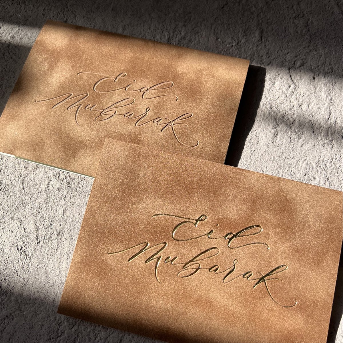 For my 2022 Eid Cards, I sourced this incredible suede fabric and hot-foiled on it at home. Message me on Instagram to purchase, 6 colours available. Ps. yes. They feel as soft as they look 🥰
Instagram.com/Mimawrites