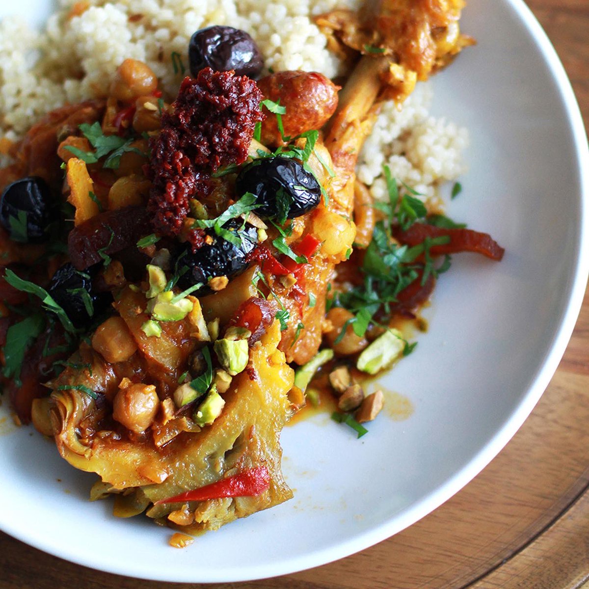BadiaSpices's tweet photo. Loaded with vibrant North African flavors, this Chicken, Sausage &amp; Artichoke #Tagine is one of those #ComfortFood dishes that everyone will enjoy. Seasoned with Chef @AndrewZimmern’s Moroccan Moon from @BadiaSpices, it’s company-worthy &amp; easy to make! https://t.co/FwuKCyX0W5 https://t.co/OMXYt0lGbd