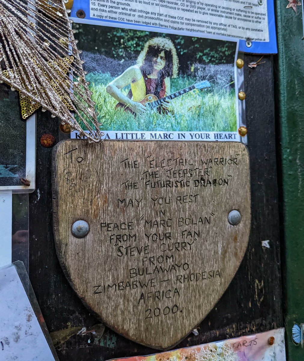 _LifeDeathMusic's tweet photo. Marc Bolan Shrine at the location of the car crash that killed him in 1977. An array of tributes and memorials are still being left by fans from all over the World 🎶🎸
#musicmemorialmonday #lifedeathmusic https://t.co/ZfCfhj4qQR