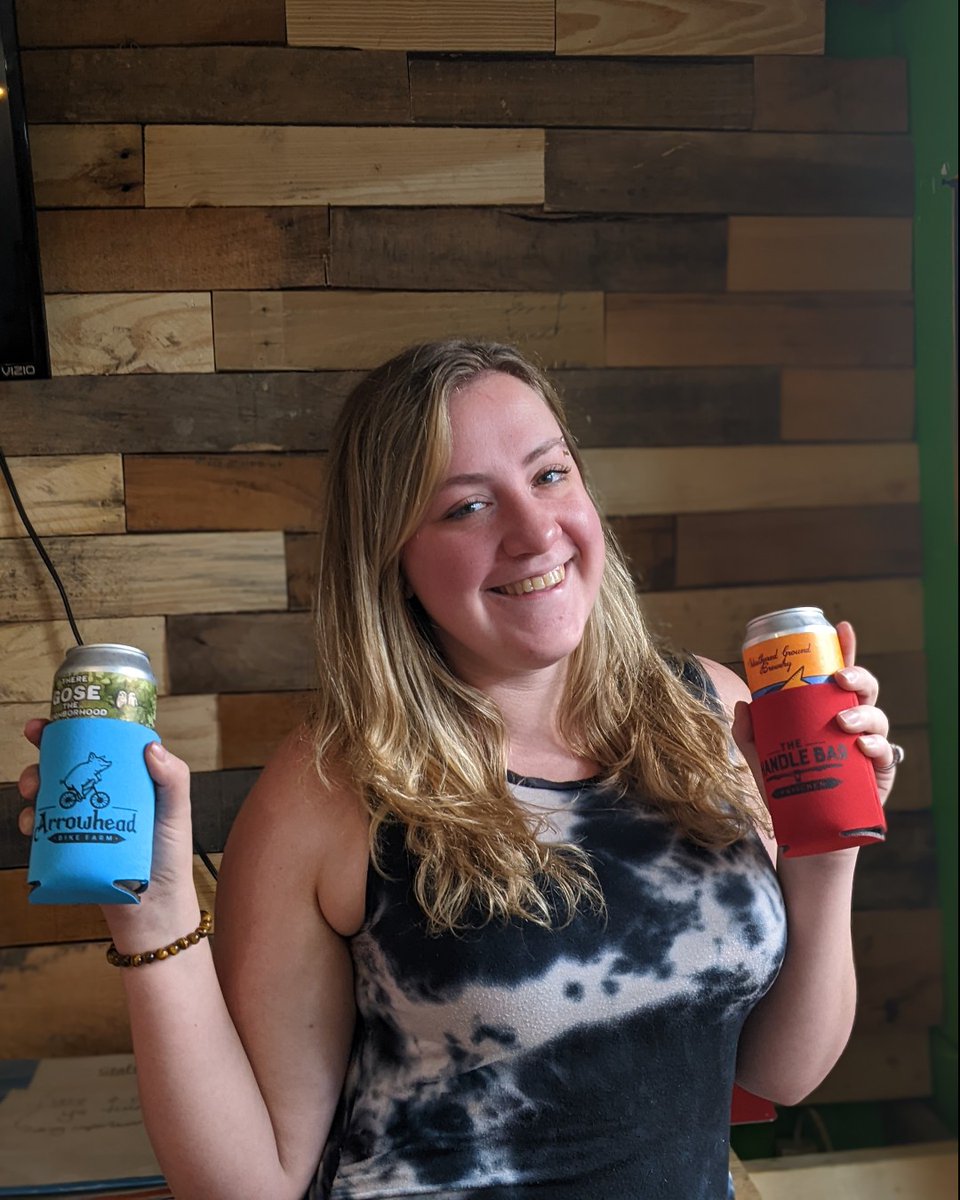 Tori is showing off our new Arrowhead Bike Farm koozies! We have four different colors. Swing by and check them out!