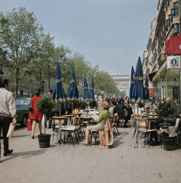 Paul Popper. 
Avenue des Champs-Élysées  c.1965  Paris 
Bonjour. Hello!