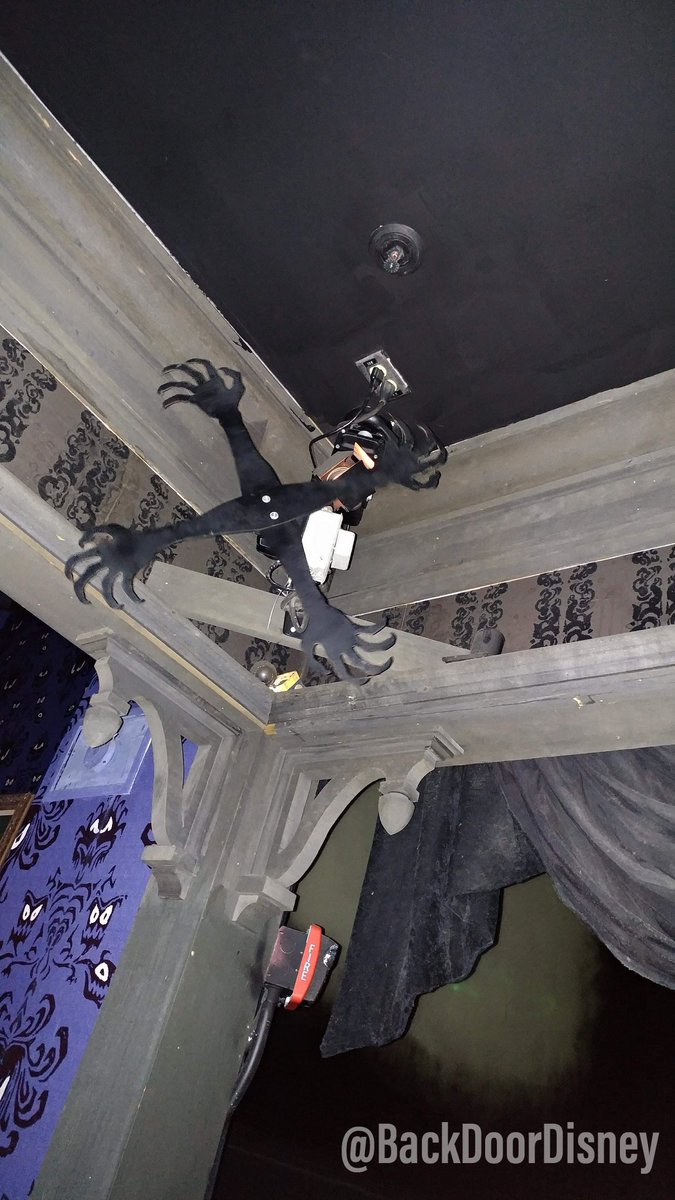 Update to one of my older post with a lot clearer of a picture. This is how the shadow hand on the clock effect is done in the Haunted Mansion. Very practical stuff!