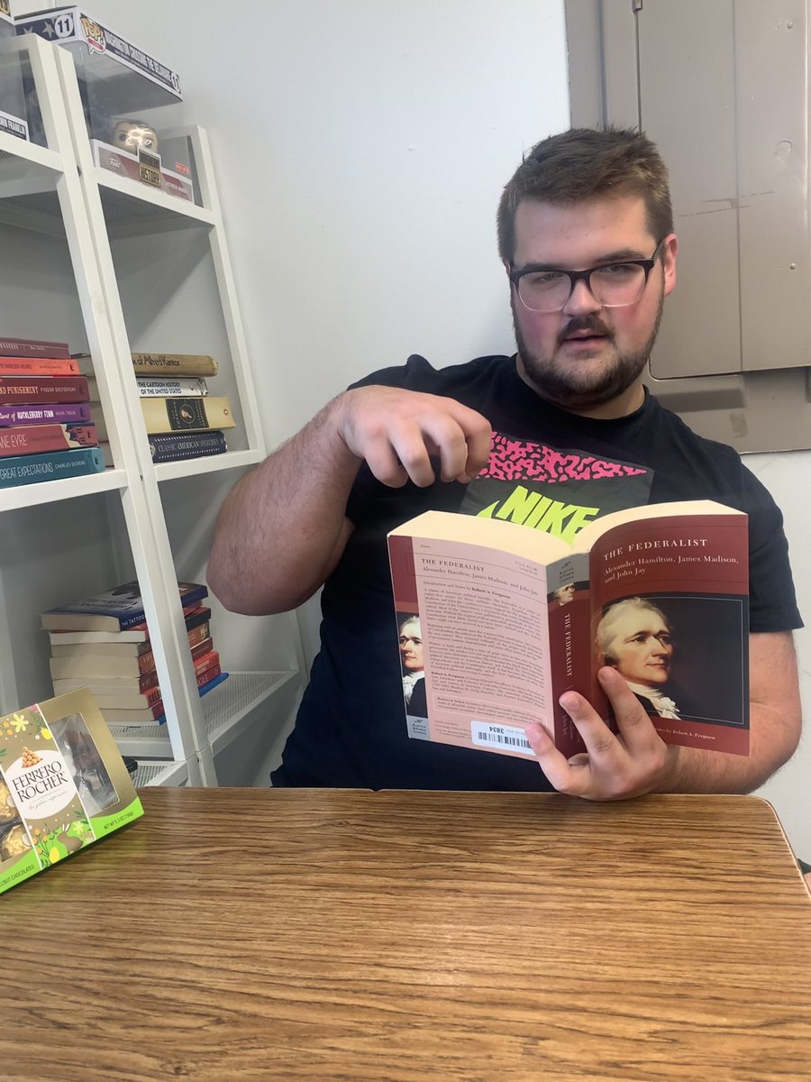 ReaganA_GOV_'s tweet photo. It’s always nice to see SUPREME OVERLORD ONE reading diligently and working hard to learn more and grow our country. Para as pesosas!🤑🤠#sponsoredbyFerreroRocher #chocolateislife #EATIT @lindseychudley https://t.co/ko5pICpNMk