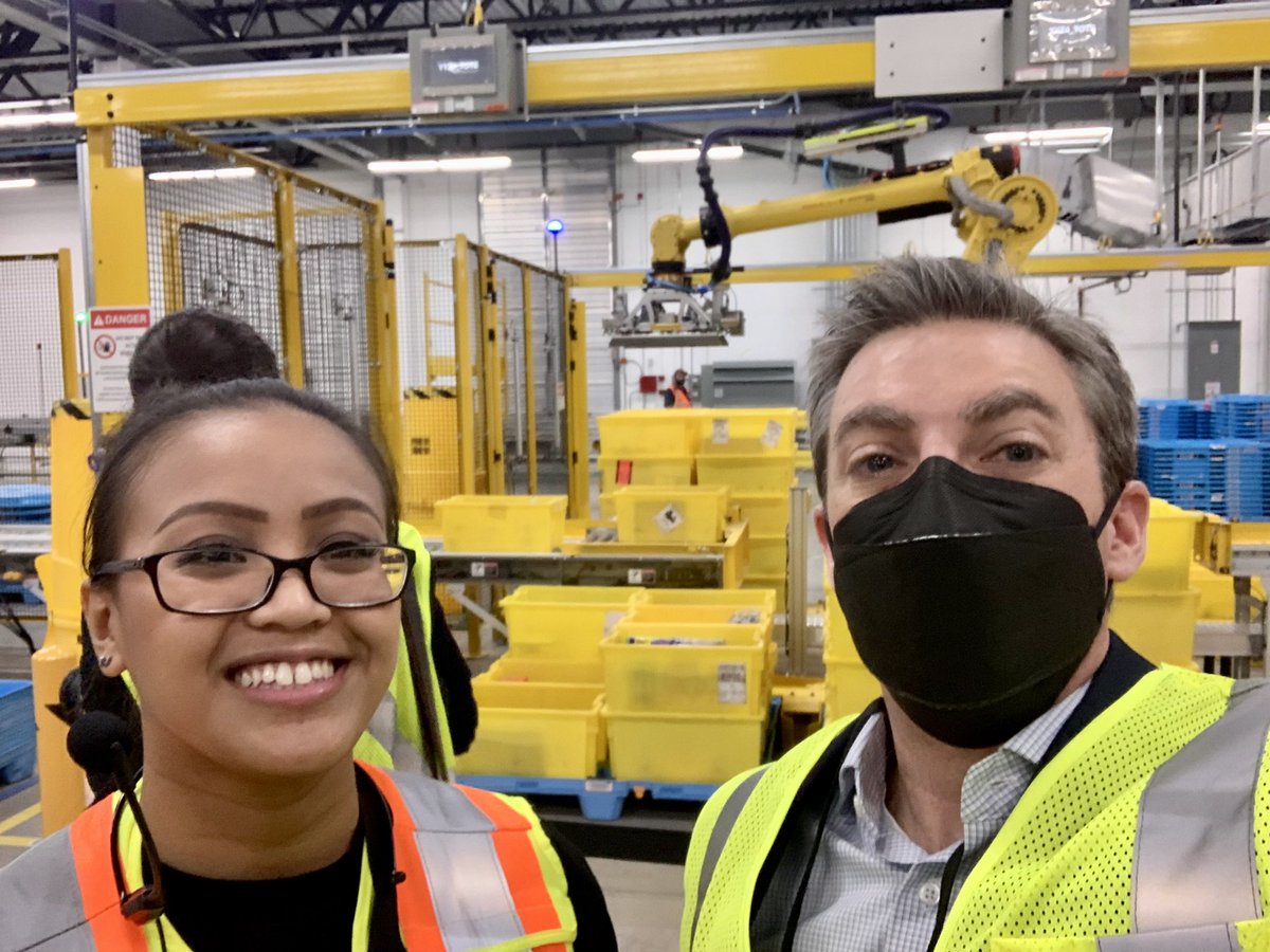 queensprofessor's tweet photo. Had my first visit to an Amazon fulfilment centre using #robotics to make work safer and more efficient for employees.  Great to meet Donna Skelly (MPP) and Dave Ellis (@CANFIRST). Kudos to Amazon for supporting #stem in Canada!  👍🏻 I even got to (manually) pack an order! 🤣 https://t.co/ywCPLFPpBl