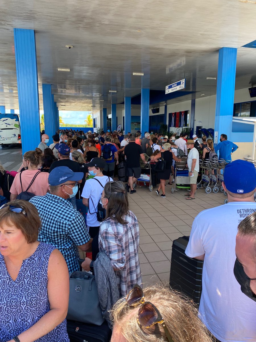 Lara_RMT's tweet photo. Cayo Coco airport currently. Hot. Sweaty. Pissed off customers. #sunwing @SunwingVacay they called in VIP sunwing customers and I'm pretty sure we're all VIP at this point https://t.co/GIK01MiLn1