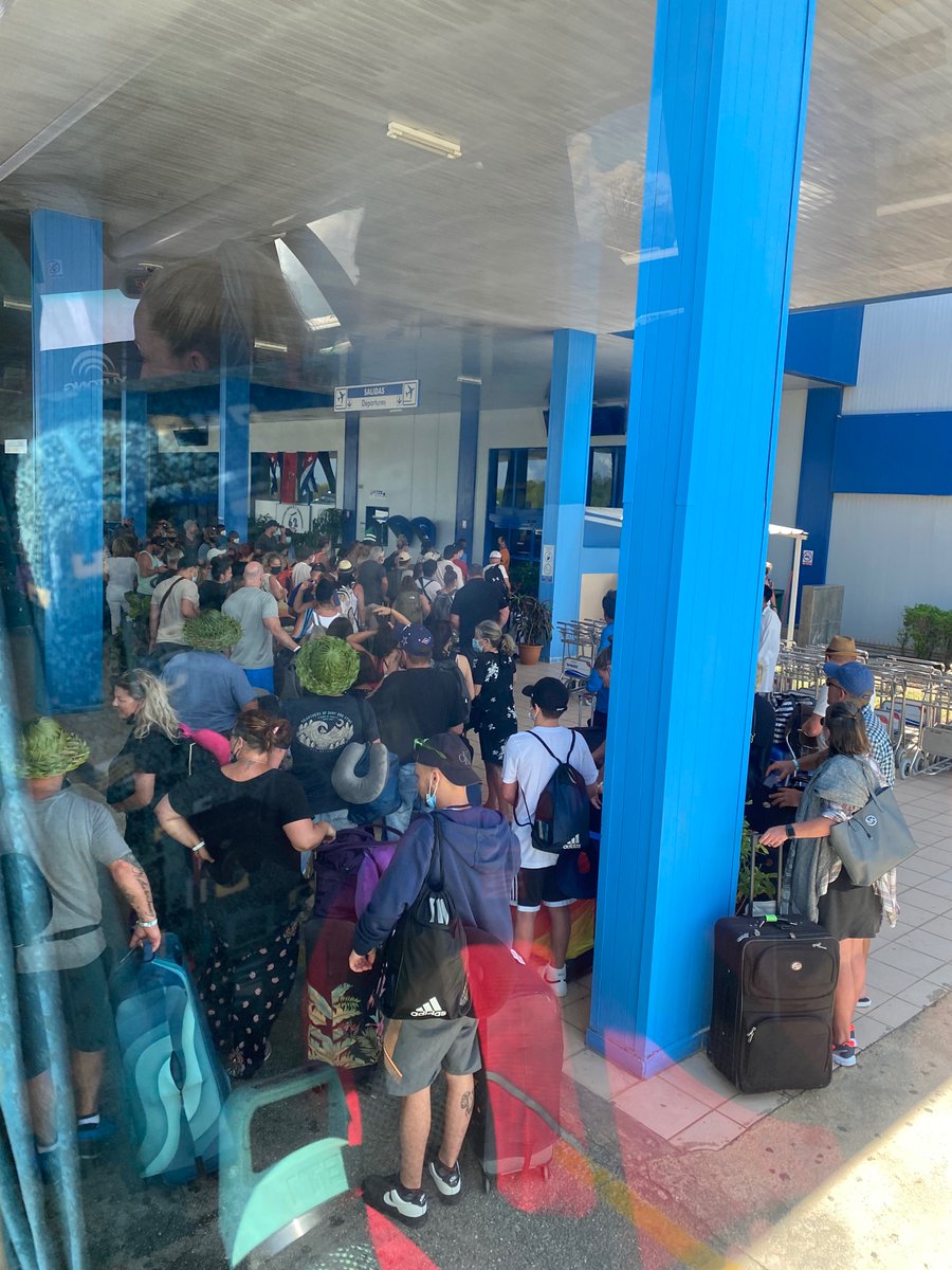 Lara_RMT's tweet photo. Cayo Coco airport currently. Hot. Sweaty. Pissed off customers. #sunwing @SunwingVacay they called in VIP sunwing customers and I'm pretty sure we're all VIP at this point https://t.co/GIK01MiLn1