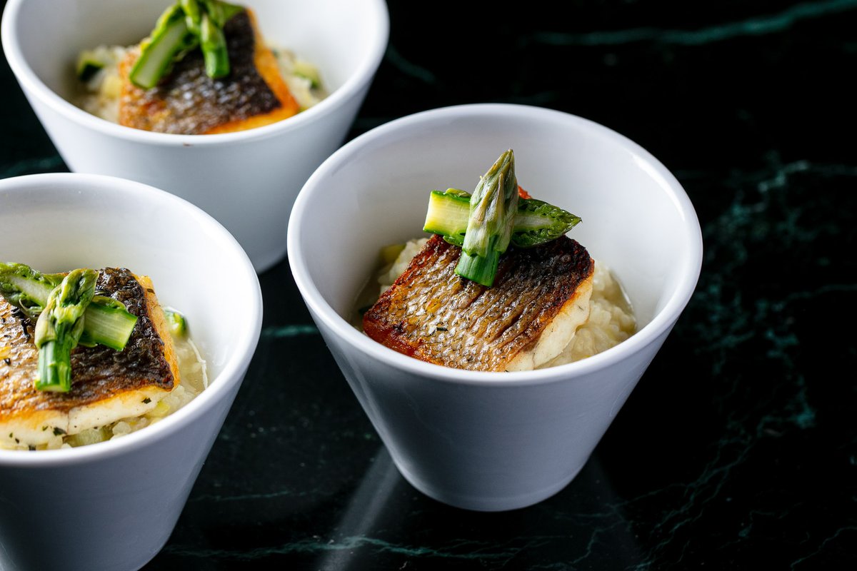Beautiful #bowlfood which showcases our passion for #finefood, #premiumingredients, and #innovativemenus… Introducing our seared #seabass with a zested risotto and English asparagus – the perfect #seasonaldish to wow your guests.