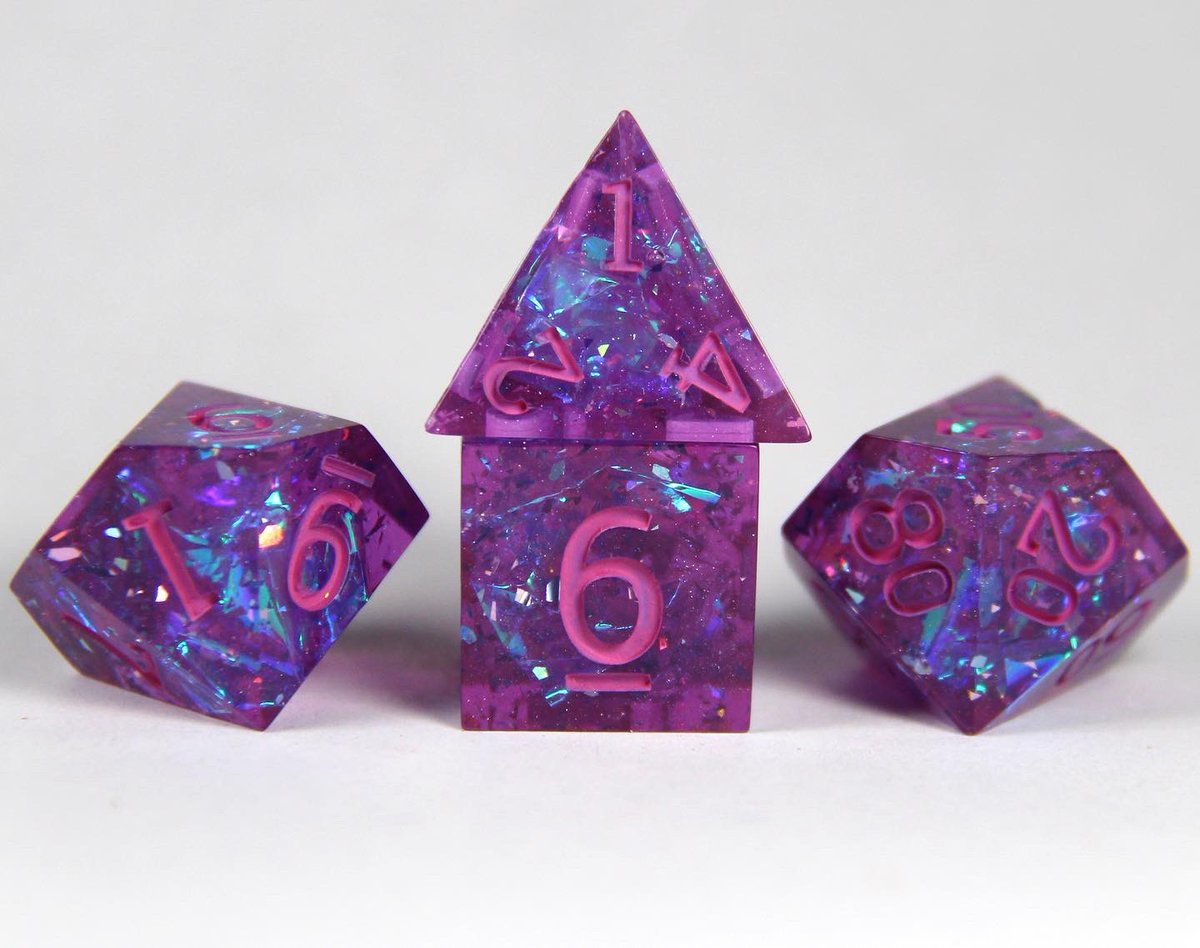 Thoughts on the inking color of this set? I’m starting to second guess myself 🤔🤔🤔

Suggestions are appreciated! 

#Dnd #dice #ttrpg #resinart #handmadedice #sparkle #glitter
