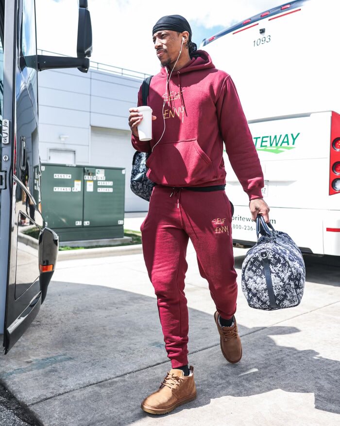 selfenvyco's tweet photo. All-NBA Shooting Guard Demar DeRozan of the Chicago Bulls pictured in the SE Burgundy tracksuit en route to Milwaukee for their first round playoff matchup against the Milwaukee Bucks. https://t.co/iPGOY76WQr