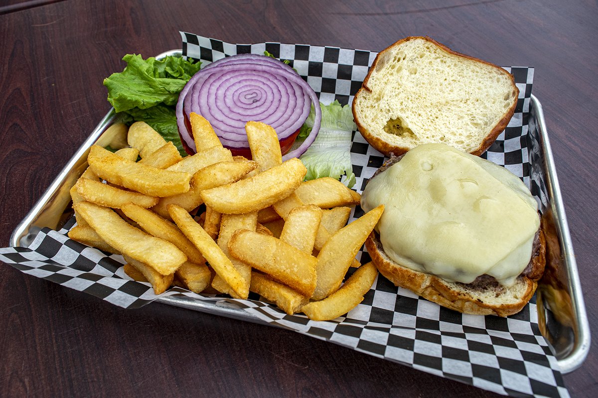 Nothing quite like that first juicy bite! 🍔 Jimmy O's Cheeseburger