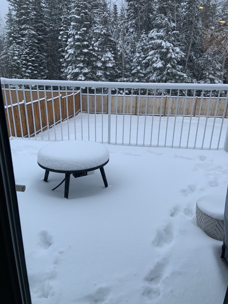 I knew it was too early to put my fire table out… #toosoon #aprilflurries