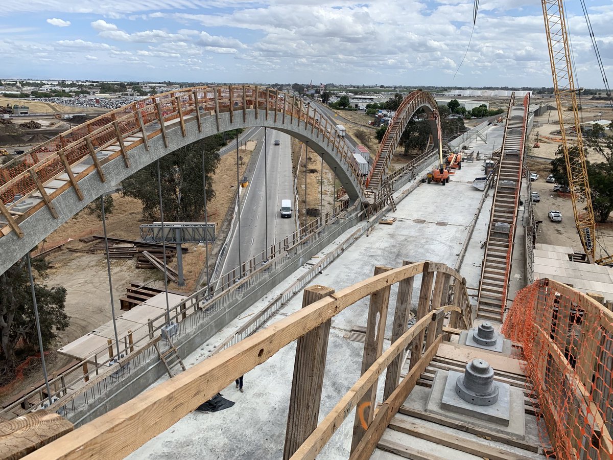 brianannis's tweet photo. I was able to visit two iconic ⁦@CaHSRA⁩ structures in Fresno today. One done, one nearing completion. Look for the 6 arches during your next trip on Highway 99. https://t.co/YO47LuGaSl