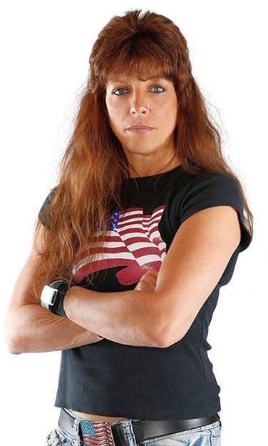 Did you hear mullets are back in style? Neither did we but we assume the legends already knew this. So in a way, Patti Rose is well ahead of the curve. Fashion sensibilities aside, her career is a long one and she's come to teach the "young'ns" of AFW a lesson or two.