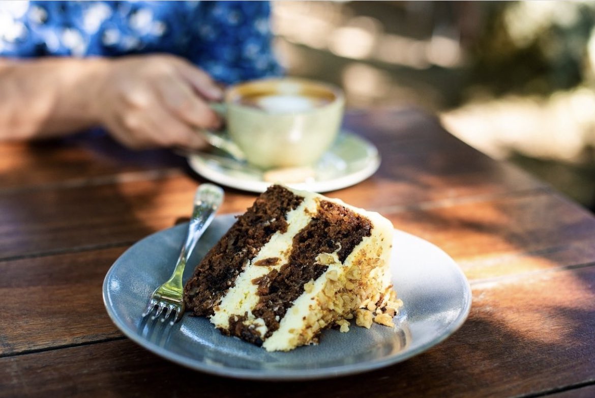 Indulge your sweet tooth with a slice of cake and a hot beverage of your choice for only R55 at The Farm Shop.⁠