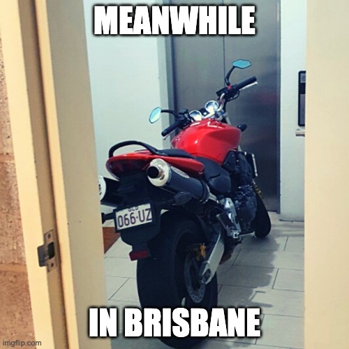 deconstruct64's tweet image. Asking for a friend... Is it ok to park a motorcycle in the corridor on the 2nd floor? @StrataQld @QldFES