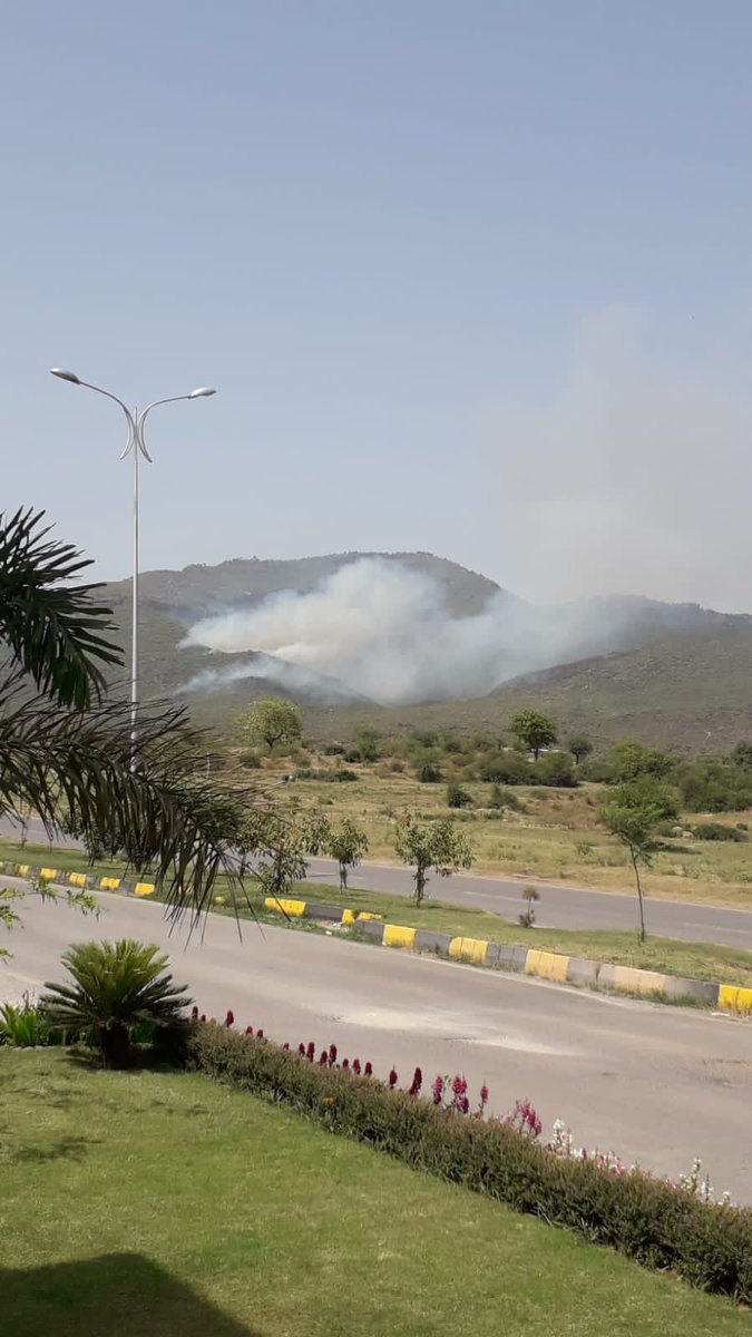 Hajiras's tweet photo. @dcislamabad  Fire in margalla hills near D12...its spreading fast!
@CDAthecapital https://t.co/pPxB5xUO9N