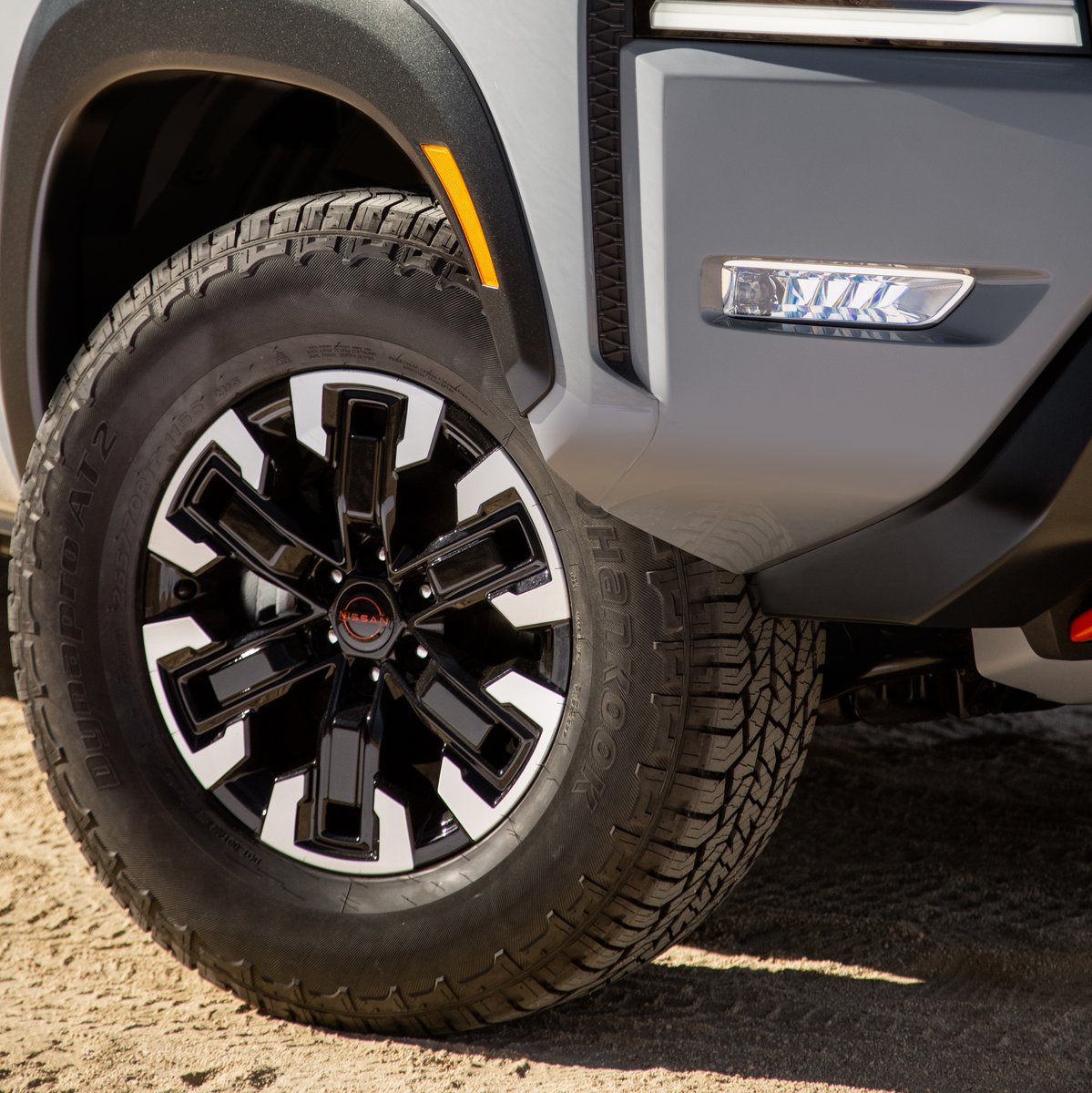 Nissan's tweet photo. Calling all Nissan adventurers! Can you guess the truck model behind these awesome details? Let us know! #Nissan https://t.co/rtQMvvsdMU