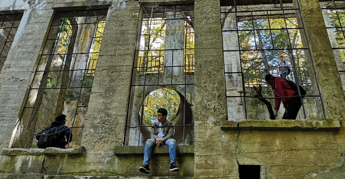 Spring is coming, and with it a chance to explore. This wasn't staged, these people just conveniently were in position: Carbide Wilson Ruins, Gatineau Park.