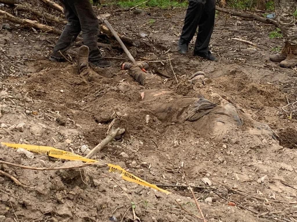 Podolyak_M's tweet photo. Torn-out nails. Tied hands. Another grave of 2 civilians was found in the village of Kalynivka, Kyiv region. How many such crimes are in the occupied territories right now? 🇷🇺 chose the path of terror of the civilian population and must be recognized as a sponsor of terrorism. https://t.co/neyKCeZNGu