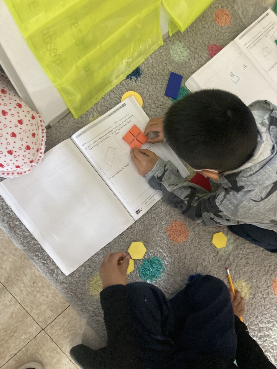 Making new shapes with shapes!  Hexagons, squares, trapezoids- we are learning them all!  Way to go first grade!