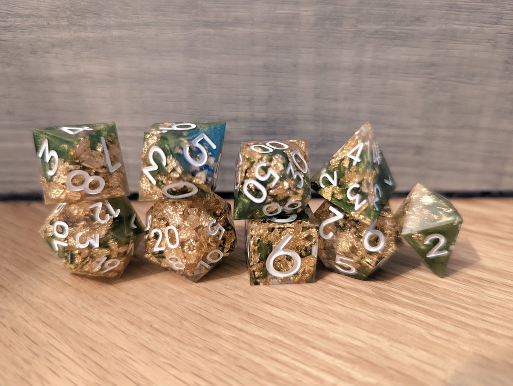 FishMakesDice's tweet photo. New dice going up in the shop today, freshly inked! I think they might be my favorite set yet. 

#handmadedice #dice #dungeonsanddragons #ttrpg #dnd #dicemaker #mathrocks https://t.co/SgRqsxUPQo