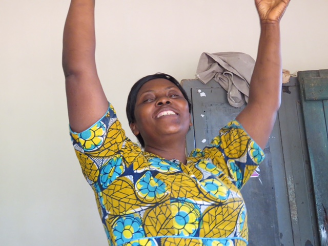 Lillian the Headteacher expressing her thanks when seeing her freshly decorated Headteacher Office for the first time 🤩  
The office was decorated and the ceiling repaired by Norman Raynor on a visit with the charity in 2018.