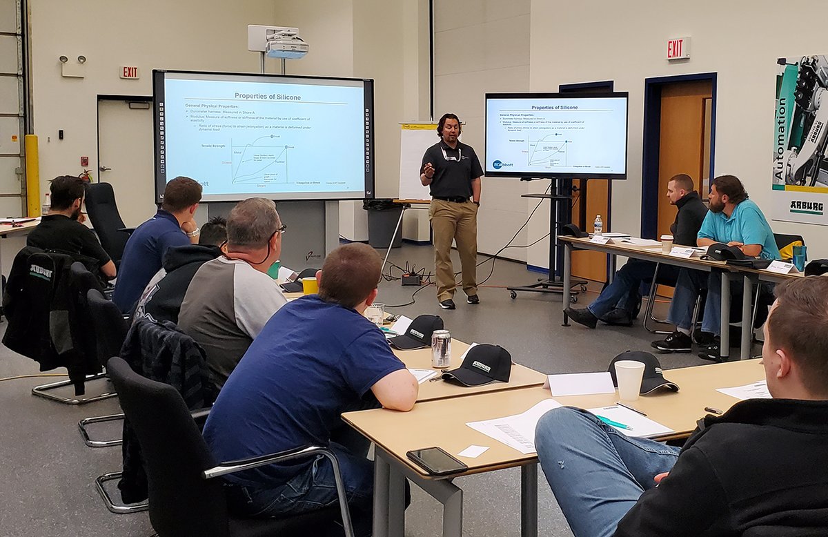 RDAbbottCo's tweet photo. At RDAbbott, we love talking about Liquid #Silicone #Rubber and Liquid Injection Molding. Here's our Application Engineer Craig Lustek at a training course hosted by @arburgworld. Contact us today with your #LSR questions! #SILASTIC https://t.co/bdYTpoCnFL https://t.co/DsEqqTnuo8