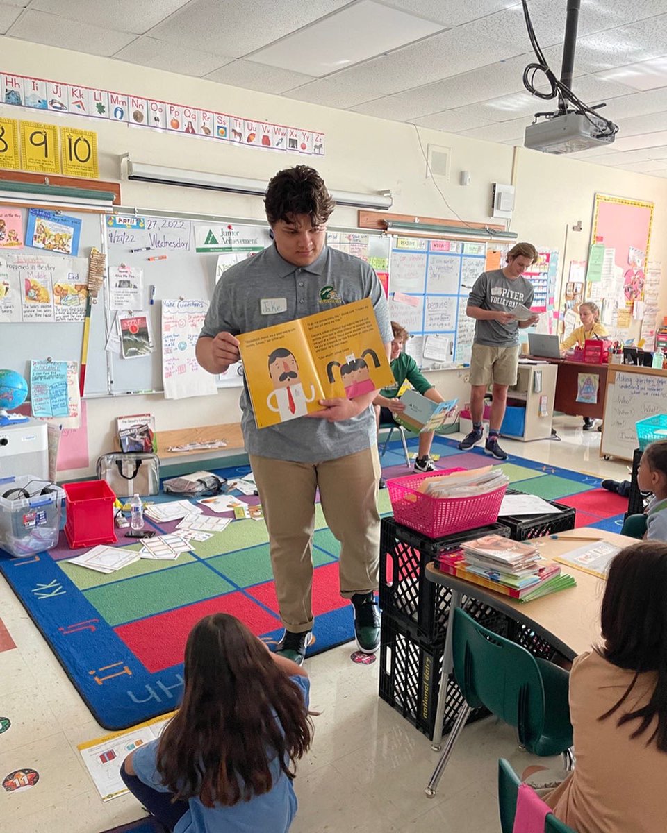 JAofPBTC's tweet photo. The @jupiter_high Boys Volleyball team, and the Latinos in Action students became JA High School Heroes when they visited @JupiterElem! They taught JA Ourselves and JA Our Families to the kindergarten and first grade students who were extremely excited to have the visitors. https://t.co/zw9zwtXqLw