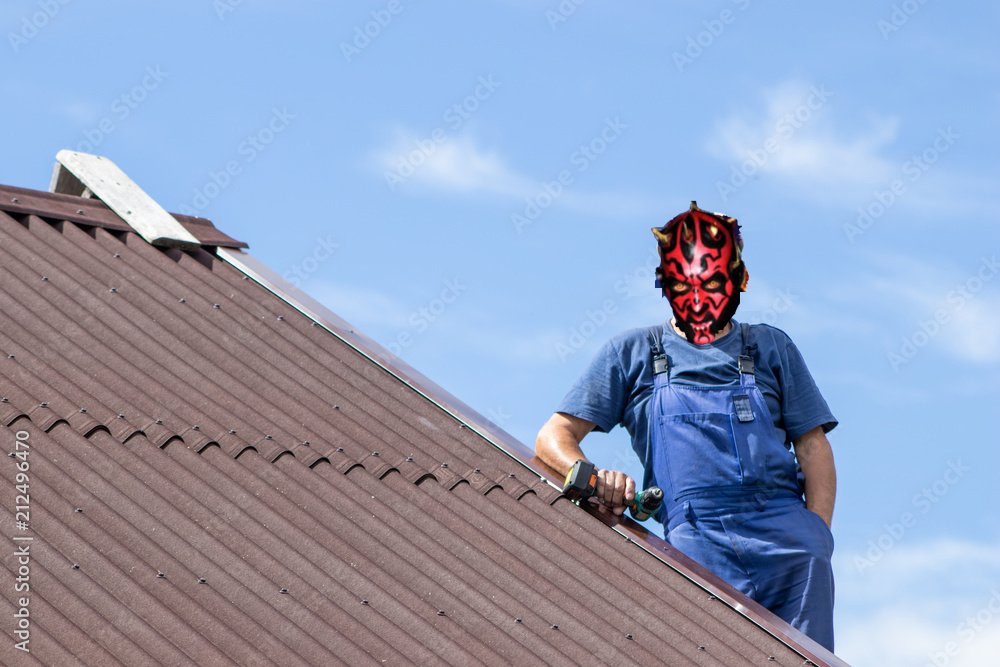For no good reason I made this photo of Darth Maul working on a roof. Enjoy!