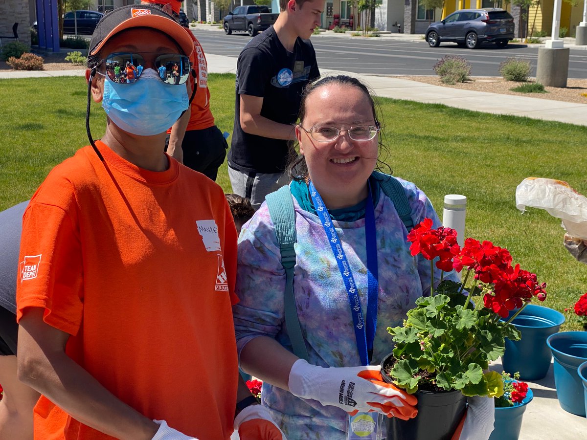 HomeDepotFound's tweet photo. It feels like spring in Las Vegas, where #TeamDepot volunteers not only revamped outdoor space at an independent living community for people with disabilities, but also taught residents how to pot their own plants for the front porches of their homes. These smiles say it all 🌸 https://t.co/g5bu2gndWF
