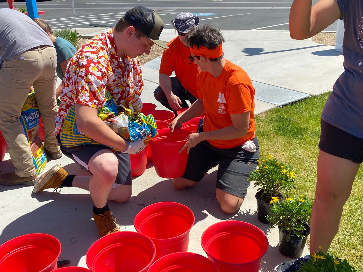 HomeDepotFound's tweet photo. It feels like spring in Las Vegas, where #TeamDepot volunteers not only revamped outdoor space at an independent living community for people with disabilities, but also taught residents how to pot their own plants for the front porches of their homes. These smiles say it all 🌸 https://t.co/g5bu2gndWF