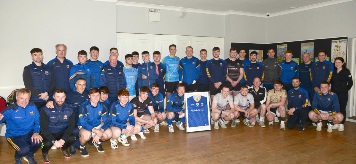 OfficialLDGAA's tweet photo. Manager Billy O'Loughlin presented Longford captain Mickey Quinn with a framed shirt to commemorate his 100th appearance for the county in March 2022. Mickey was joined by his family and teammates to commerate this fantastic achievement by one of the greats of Longford football. https://t.co/0hCF0WCDW7