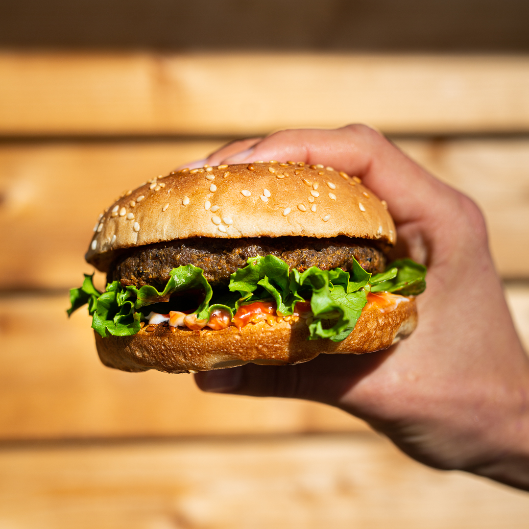 When a meal is this delicious, and fits in one hand? That just means we have the other to cheers to National Hamburger Month! 🍔