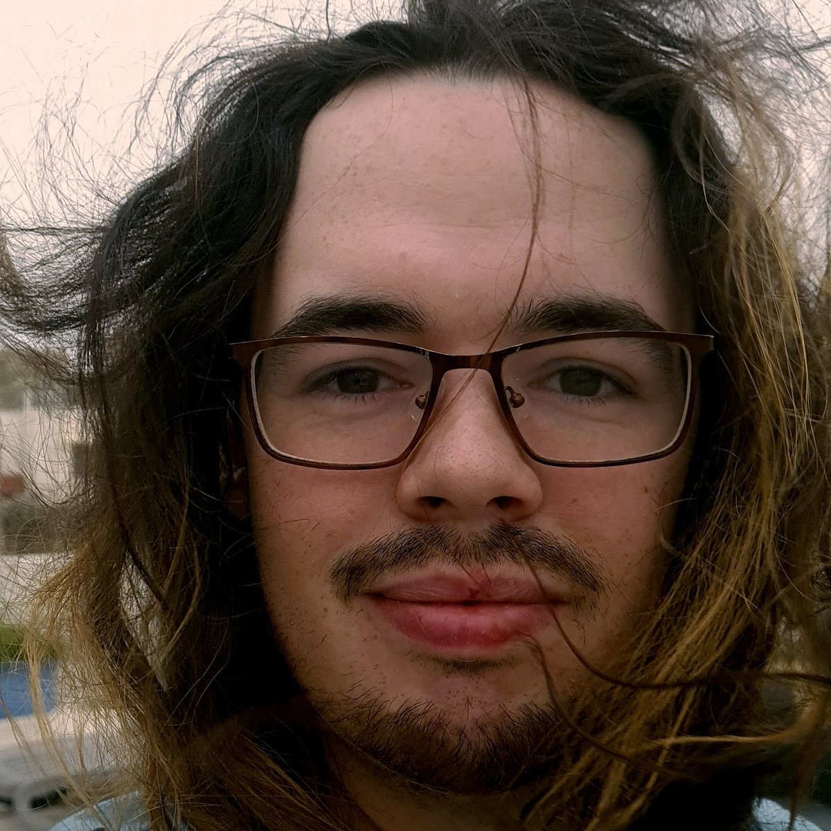 OCSlash's tweet image. This day was windy
My hair is in my face now
It tastes not so good