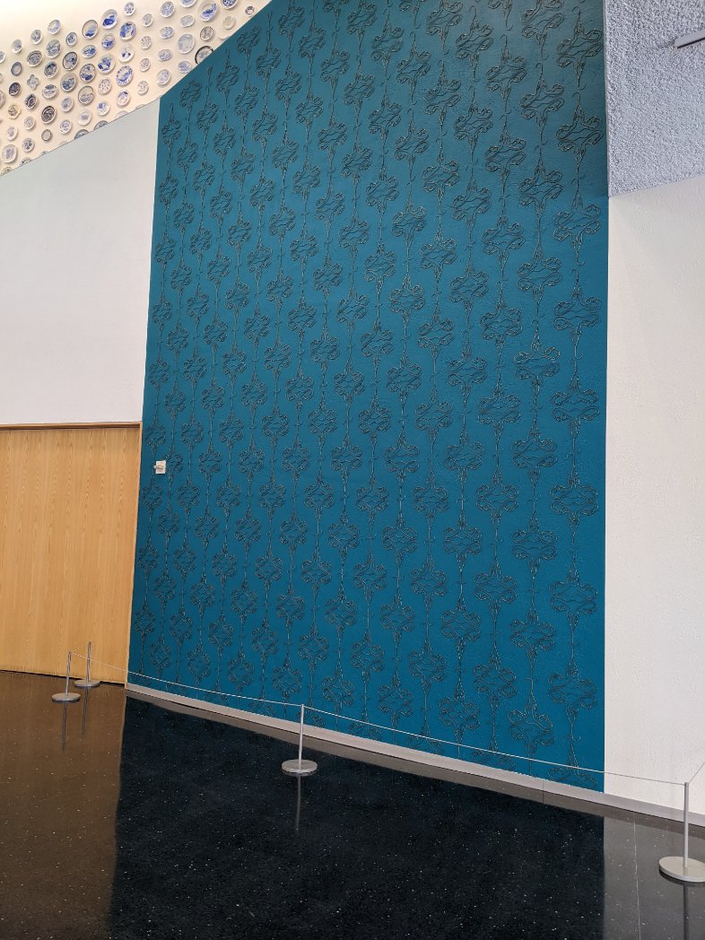 Relevant art seen at <a href="/WEareBAM/">Bellevue Arts Museum</a> exploring the trudge towards full women's reproductive rights. Take a close look and see the elegant wall pattern is wire coat hangers bent into fallopian tubes.

Artist @hballardmartz, "Danger of Nostalgia in Wallpaper Form (in utero)", 2020