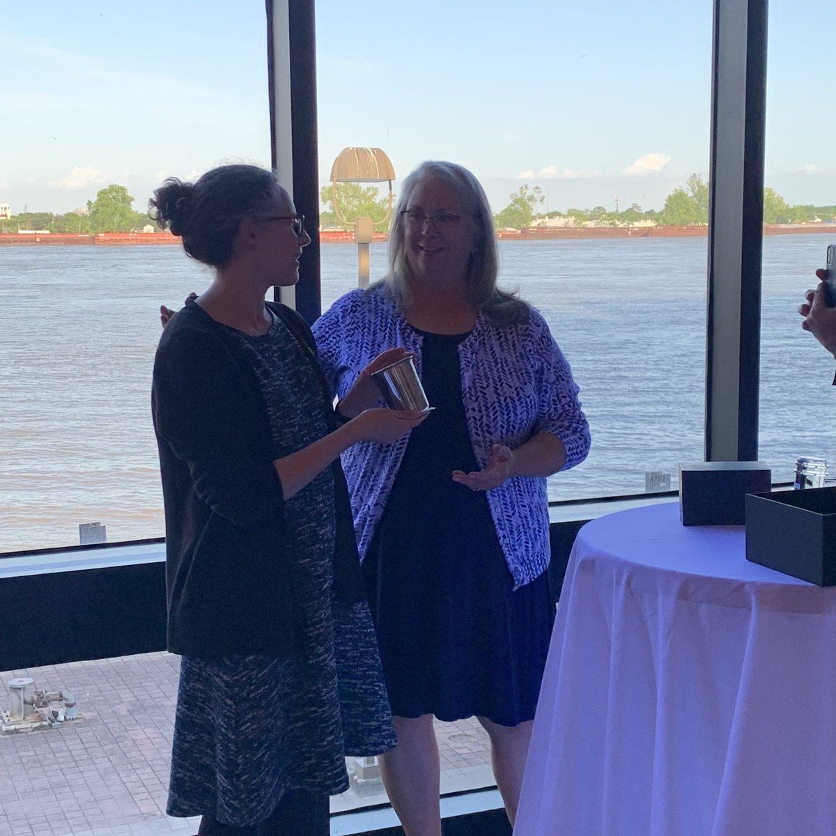 hurstej's tweet photo. Reception time @LisaTraditi @krisalpi receiving their presidential gifts from @MedLibAssn #MLANET22 #medlibs https://t.co/V5QAxZ7fbD