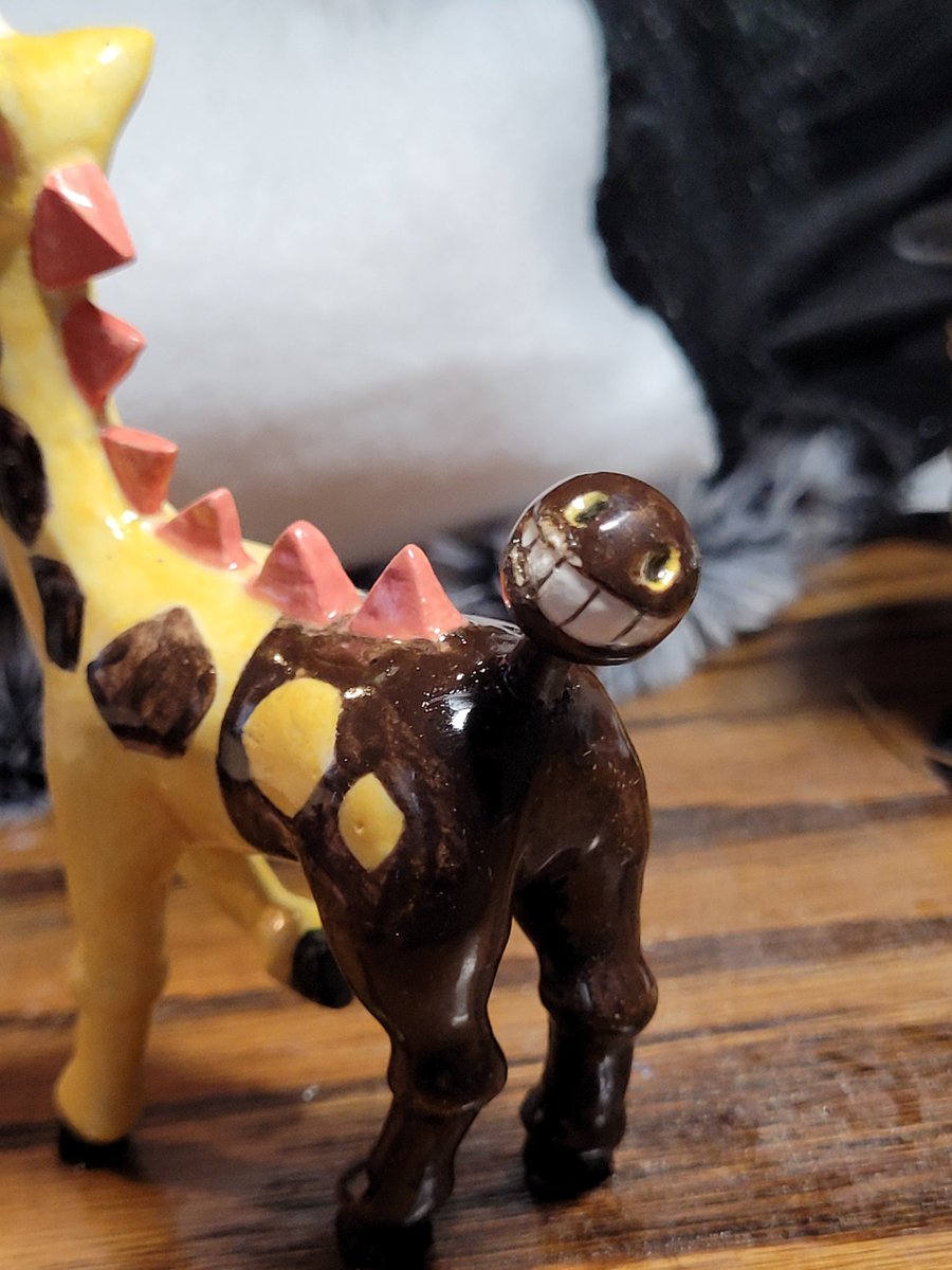 his tail got a little fucked up cause it fell off in the kiln but look at my girafarig :-)