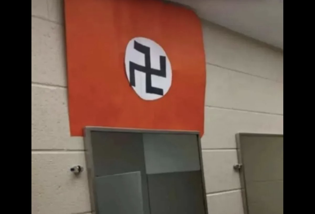 StopAntisemites's tweet photo. HORRIFYING - a giant swastika flag was hung in a bathroom at Grayslake North High Cchool (@GrayslakeNorth) in Grayslake, Illinois.

This should never be tolerated in 2022 America @Roscoe2James and we hope a full investigation into the atrocious incident will take place! https://t.co/a768u6VZbS