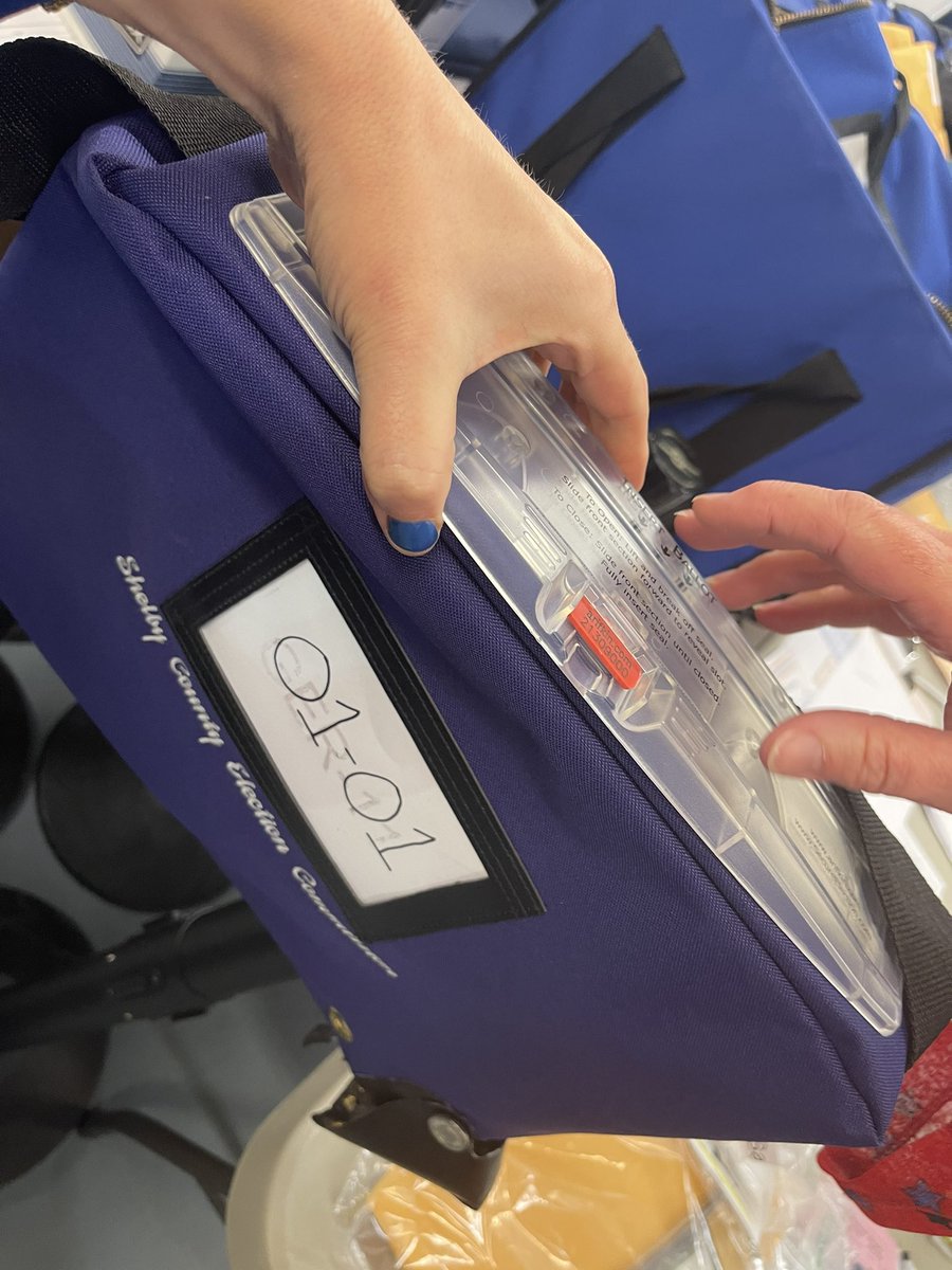 MemphoNewsLady's tweet photo. #ElectionDay #MORE: They drop off the memory card first in the clear pouch. The card is double checked then taken to a machine for tabulation.
The sealed purple ballot bag is dropped off next.
#Vote901 https://t.co/iG22EwE5zW