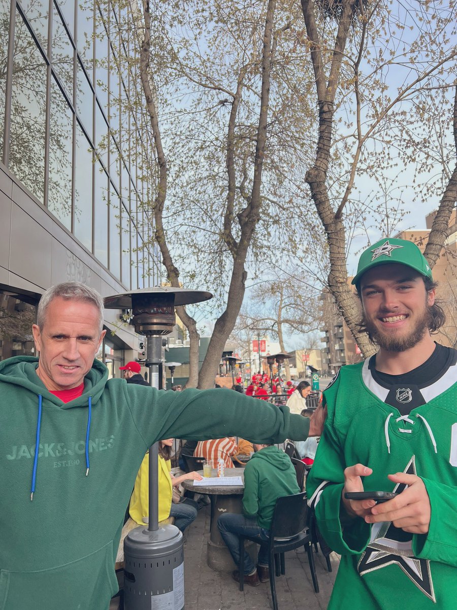 In the midst of the <a href="/NHLFlames/">Calgary Flames</a> Saddledome is one of a handful of <a href="/DallasStars/">Dallas Stars</a> fans!
