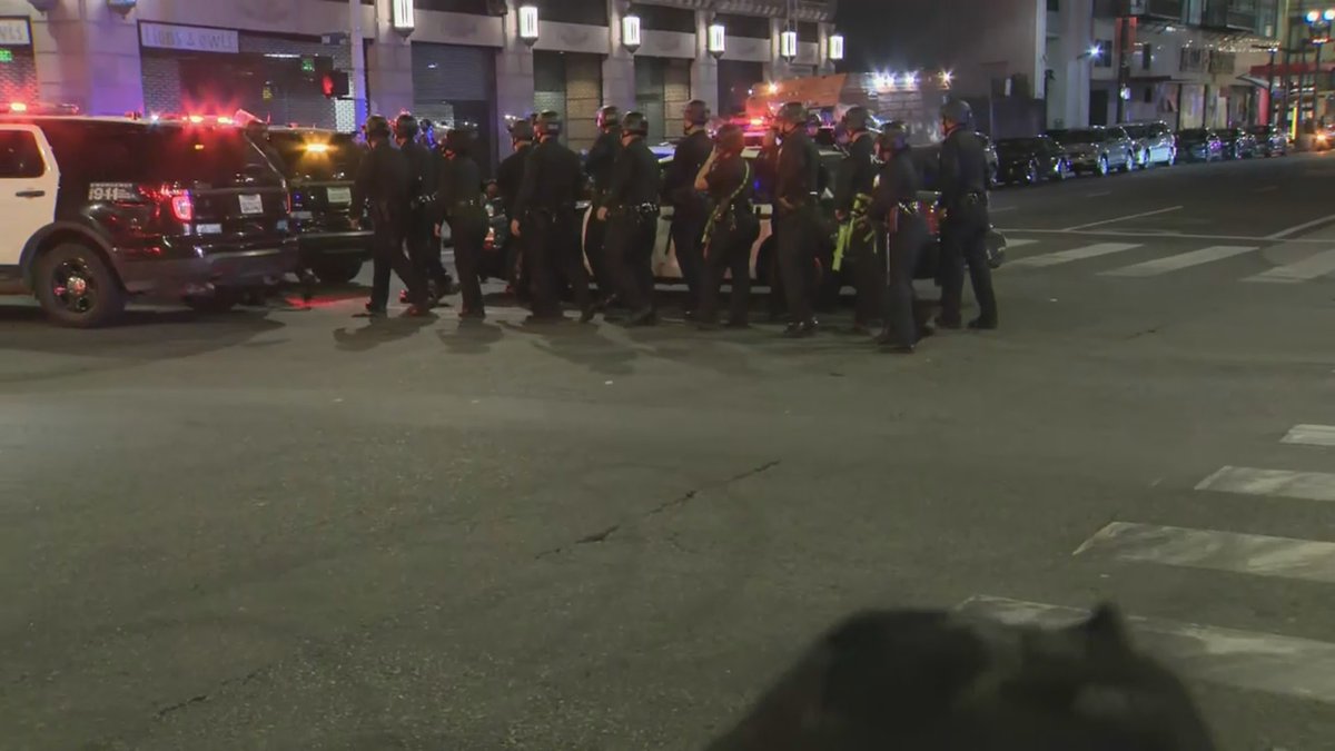 CBSLosAngeles's tweet photo. #BREAKING: LAPD has declared a city-wide tactical alert, placing all officers on high alert. Police are currently trying to control an unruly crowd of protestors at Pershing Square. https://t.co/tr3MDgCH5M https://t.co/p505lKSNwd