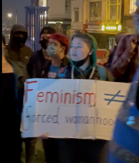 reel_woman's tweet photo. A wee thread on the kids protesting the @Womans_Place_UK meeting in Bristol. This picture really struck me. This young woman is protesting against feminists who are working together to make women's rights stronger and to support each other. Her banner suggests that this is equal https://t.co/ujgle2iG4e