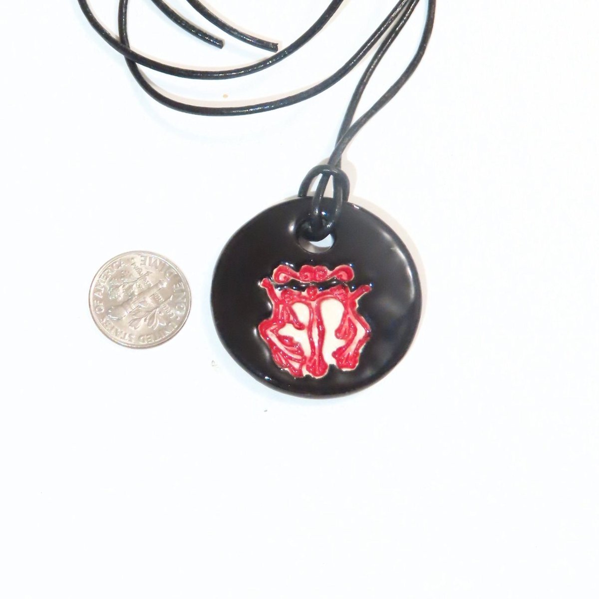 JKCJewelry's tweet photo. Sisterhood Pendant, Black Red Rejoicing Women Pendant, Ceramic Mother's Day, Gift Idea, Feminist Pendant, Celebrate women https://t.co/kVGWwIWett #handmade #pottery #ceramics #art #CeramicBead https://t.co/DndJM0dFxh