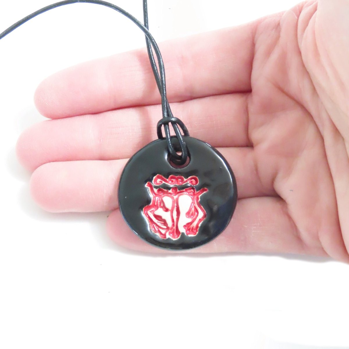 JKCJewelry's tweet photo. Sisterhood Pendant, Black Red Rejoicing Women Pendant, Ceramic Mother's Day, Gift Idea, Feminist Pendant, Celebrate women https://t.co/kVGWwIWett #handmade #pottery #ceramics #art #CeramicBead https://t.co/DndJM0dFxh