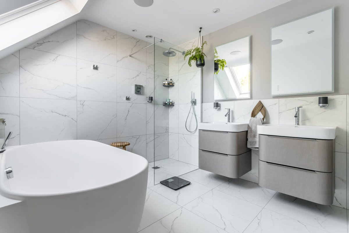 Embrace your curves!  How lovely does this bathroom look with curved #vanityunits and amazing and curvaceous freestanding bath (from one of our recent residential projects)? Such a simple change to #bathroom furniture can really soften a contemporary space.