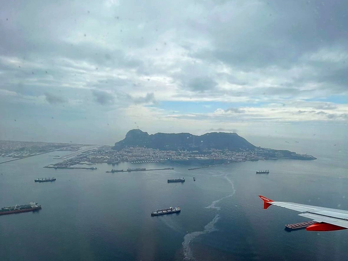 @MeteoGib a murky departure from #Gibraltar on @easyJet flight to Manchester this morning #Weathercloud #clouds #Aircraft also looks like an oil spillage visible in the bay @NautilusGib @gibraltarport @GibMarine @key2med